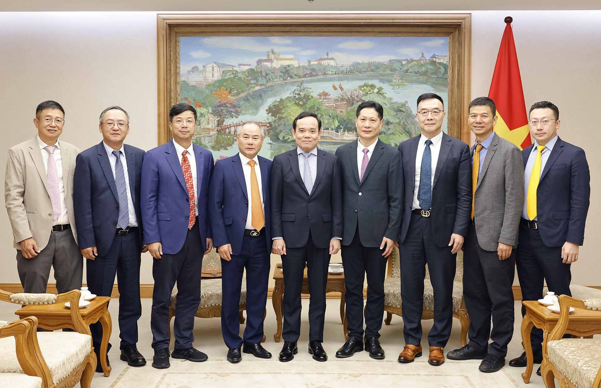 Phó Thủ tướng Trần Lưu Quang với đoàn doanh nghiệp Trung Quốc. (Nguồn: TTXVN)