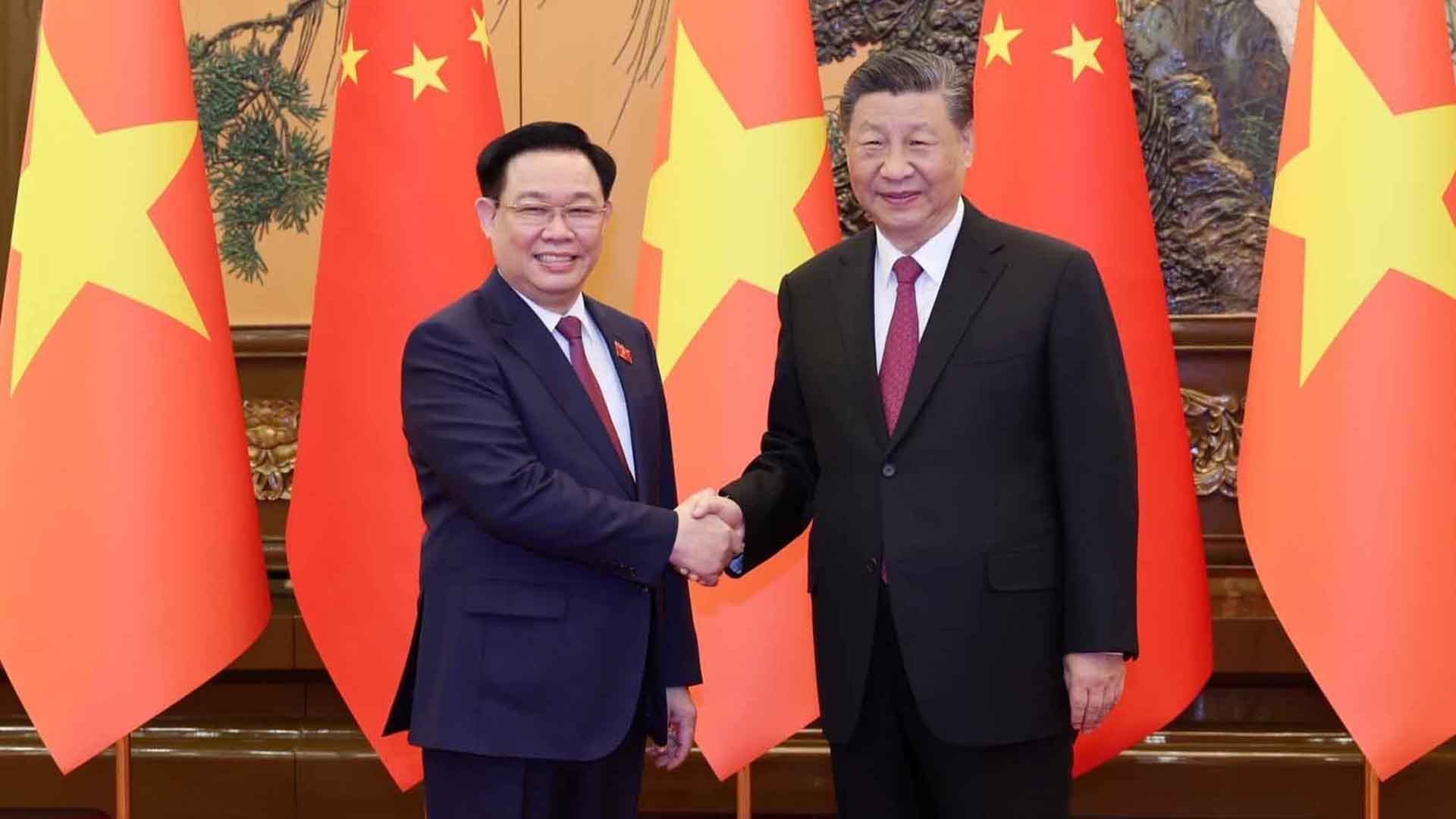 Chủ tịch Quốc hội Vương Đình Huệ và Tổng Bí thư, Chủ tịch nước Trung Quốc Tập Cận Bình. (Nguồn: TTXVN)