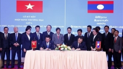 Việt Nam-Lào ký Hiệp định thương mại mới, tạo điều kiện thuận lợi cho hoạt động xuất nhập khẩu