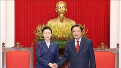 Party Politburo member Phan Dinh Trac receives Chinese Minister of Justice