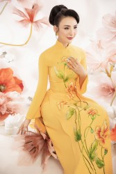 Hình ảnh Hoa hậu Ngọc Diễm xinh đẹp giới thiệu bộ sưu tập áo dài màu sắc nổi bật