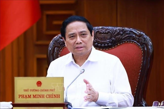 PM Pham Minh Chinh chairs meeting to discuss solutions for social housing development