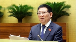 Minister of  Finance Ho Duc Phoc delivered report on financial-budget tasks