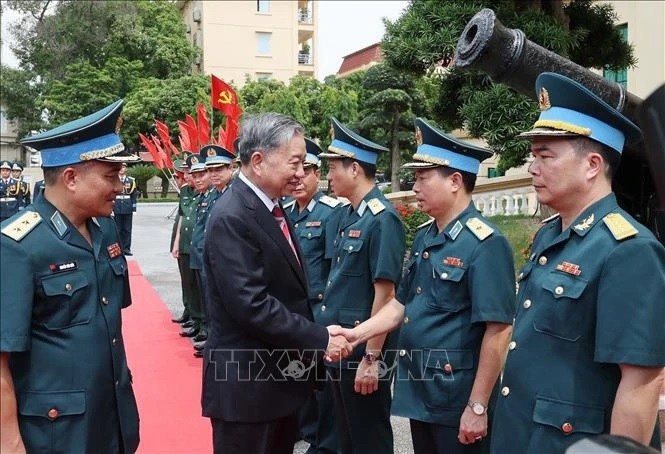President To Lam visits Air Defence - Air Force High Command in Hanoi
