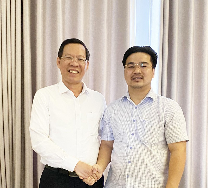 Chủ tịch UBND TP.HCM Phan Văn Mãi và ông Mai Vũ Minh.
