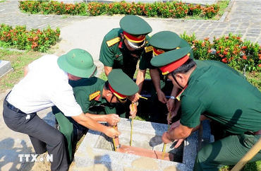 Kon Tum reburies soldiers' remains found in Laos, Cambodia