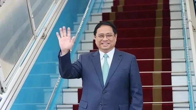 PM Pham Minh Chinh leaves Hanoi for WEF meeting, working sessions in China's Dalian