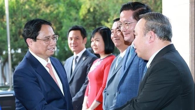 PM Pham Minh Chinh meets with Vietnamese Embassy staff in Beijing