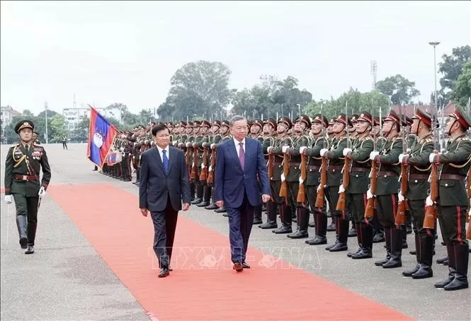 LPRP General Secretary, President of Laos hosted welcome ceremony for President To Lam in Vientiane