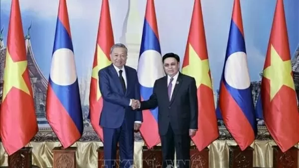 President To Lam, Lao NA Chairman Saysomphone Phomvihane reaffirme great friendship, special solidary