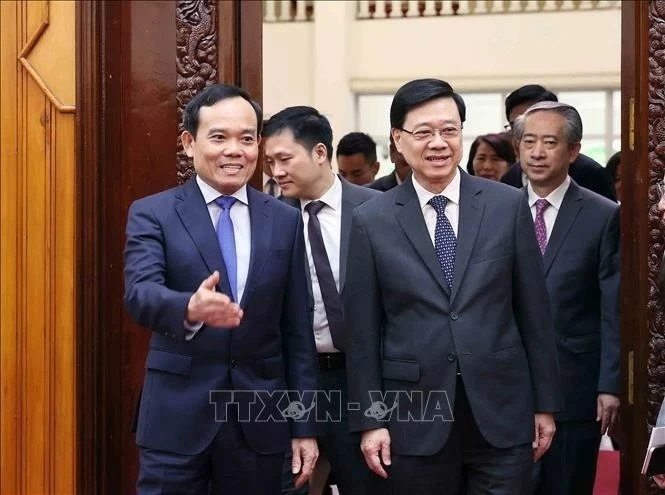 Deputy PM Tran Luu Quang welcomes China’s Hong Kong  Chief Executive John Lee Ka-chiu