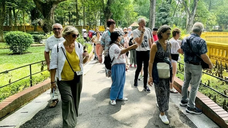 Foreign tourists at President Ho Chi Minh's Vestige in Presidential Palace Area. (Photo: nhandan.vn)