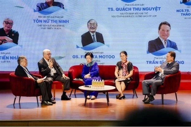 Delegates discuss at “the Vietnam forum: the moment’ held at Hồng Bàng International University in HCM City from August 16 to 17. — Photo www.sggp.org.vn