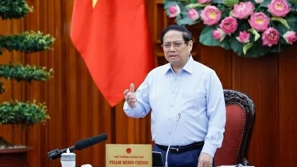 PM Pham Minh Chinh chairs Government law-building meeting in August