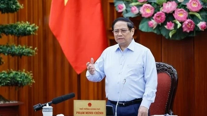 PM Pham Minh Chinh chairs Government law-building meeting in August