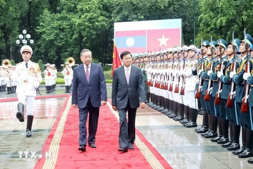 Welcome ceremony held for Lao Party General Secretary, President Thongloun Sisoulith in Hanoi