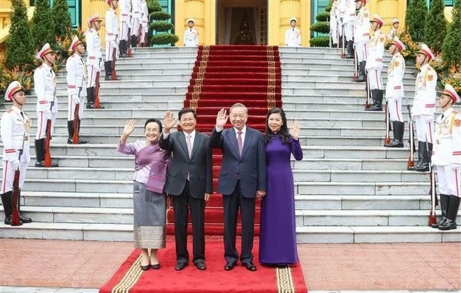 Welcome ceremony with 21 gun-salute held for Lao General Secretary, President Thongloun Sisoulith