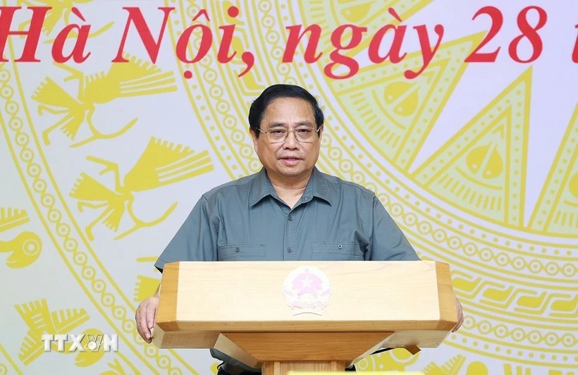 Prime Minister Pham Minh Chinh chairs the conference on September 28. (Photo: VNA)