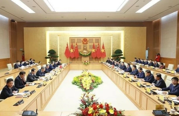 At the talks between Prime Minister Pham Minh Chinh and Chinese Premier Li Qiang. (Photo: VNA)