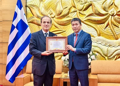 Greek diplomat honoured with friendship insignia