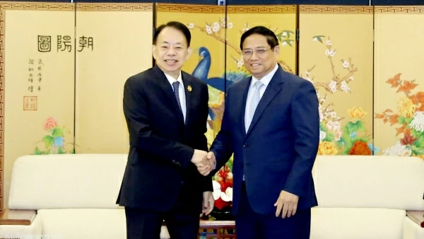 PM Pham Minh Chinh receives ADB President Masatsugu Asakawa in Kunming