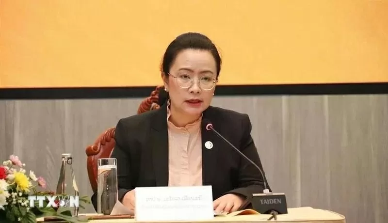 Manola Meuangmani, Director General of the Foreign Exchange Management Department under the Bank of the Lao PDR, speaks at the conference. (Photo: VNA)