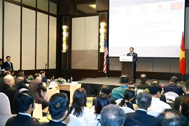 Prime Minister Pham Minh Chinh speaks at the Vietnam–Malaysia Business Meeting in Kuala Lumpur on May 25. (Photo: VNA)