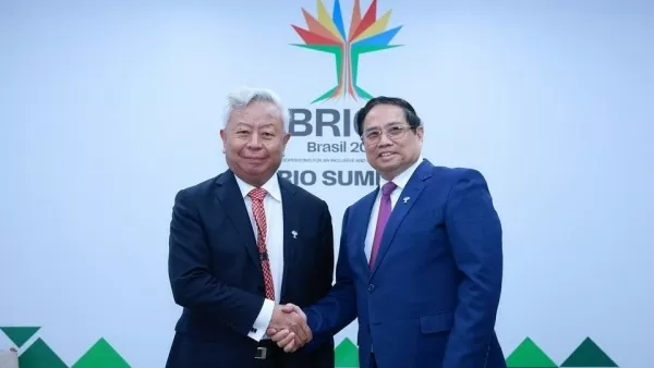 Prime Minister Pham Minh Chinh receives AIIB leader, calls for support for Vietnam’s infrastructure development projects