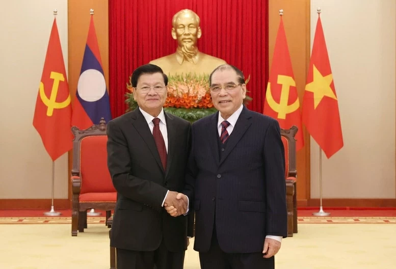 Nguyên Tổng Bí thư Nông Đức Mạnh tiếp Tổng Bí thư, Chủ tịch nước Lào Thongloun Sisoulith