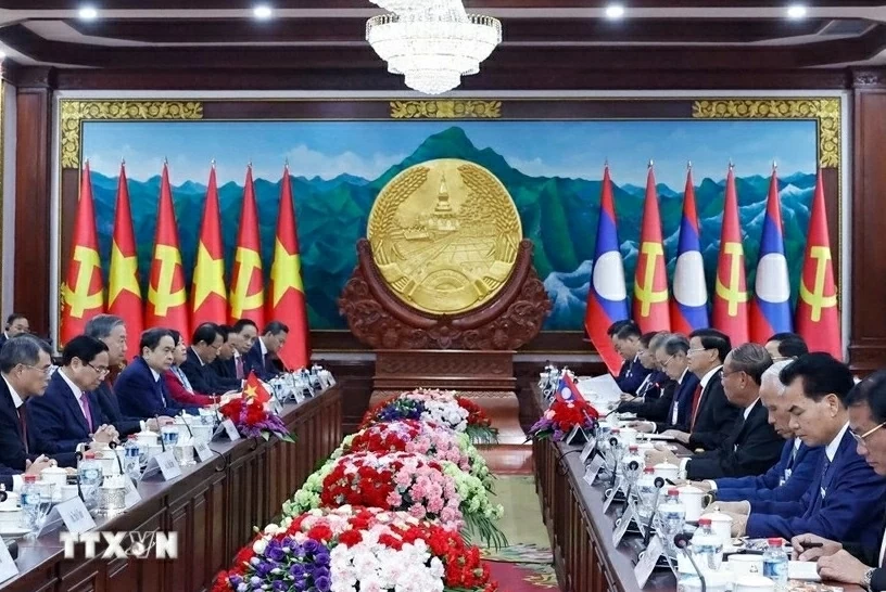 Điện mừng lãnh đạo Lào Điện mừng lãnh đạo Lào