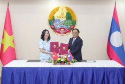 Ký kết biên bản ghi nhớ hợp tác về kiều bào giữa Bộ Ngoại giao Việt Nam và Bộ Ngoại giao Lào