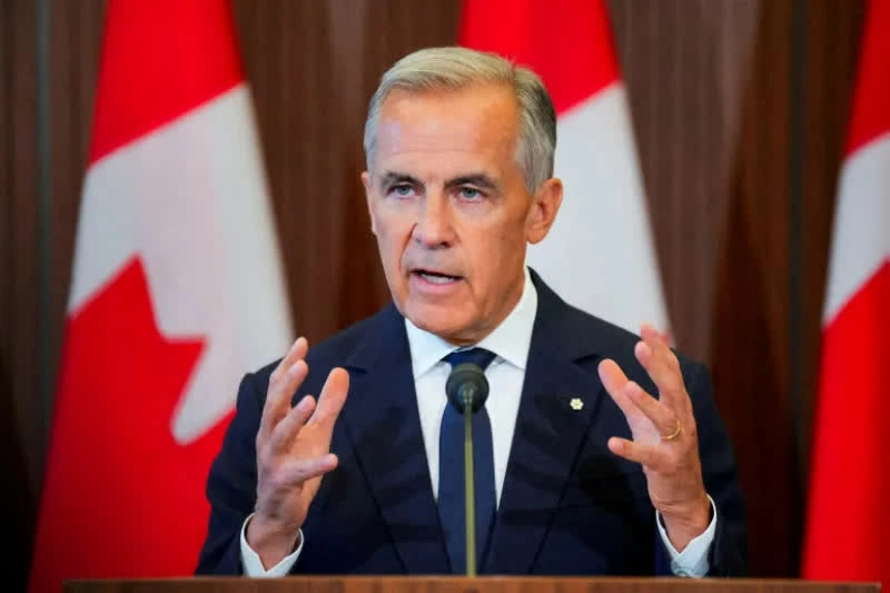 Thủ tướng Canada Mark Carney phát biểu trước truyền thông tại Ottawa, trong bối cảnh chính phủ Canada đẩy mạnh thu hút đầu tư và đa dạng hóa quan hệ kinh tế. (Nguồn: Al Jazeera) Canada xoay thế gọi vốn toàn cầu, tìm đường thoát bóng thuế Mỹ