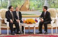young vietnamese cambodian military officers hold exchange