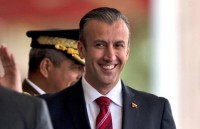 tong thong venezuela keu goi phe doi lap yeu cau my do bo trung phat