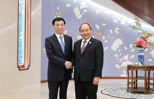 Thủ tướng Nguyễn Xuân Phúc hội kiến Ủy viên Thường vụ Bộ Chính trị Vương Hộ Ninh