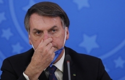 Tổng thống Brazil Bolsonaro bị kiện vì bỏ khẩu trang dù nhiễm Covid-19