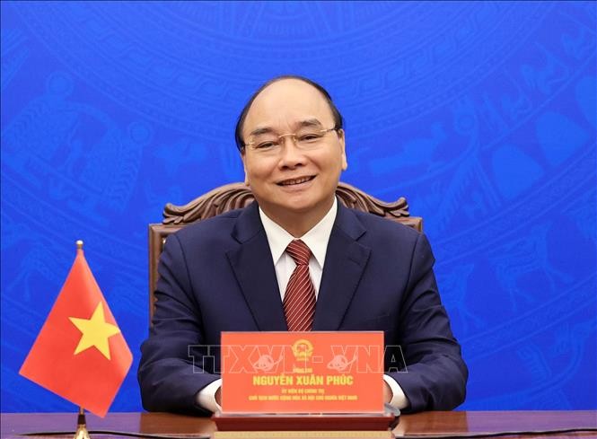 State President Nguyen Xuan Phuc (C) (Photo: VNA)