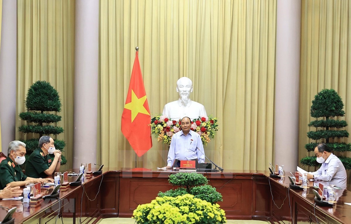 President Nguyen Xuan Phuc affirms policies towards revolution contributors, AO victims