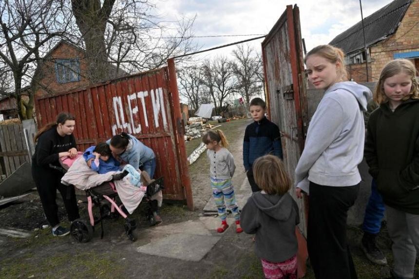 Xung đột Nga-Ukraine: LHQ báo động tình trạng bạo lực, cảnh báo nguy cơ với trẻ em. (Nguồn: AFP)