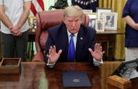 tong thong trump de doa ap thue moi doi voi cac cong ty san xuat ben ngoai nuoc my