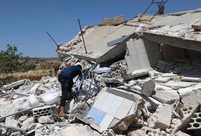 đống đổ nát của một ngôi nhà bị phá hủy ở làng Iblin thuộc vùng Jabal al-Zawiya thuộc tỉnh Idlib, miền tây bắc Syria do phiến quân nắm giữ vào ngày 10 tháng 6 năm 2021. (nguồn: AFP)