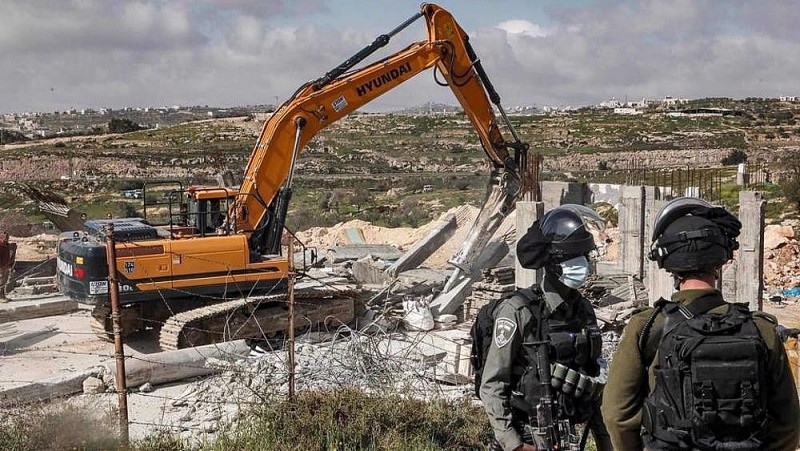 Israel phá dỡ một ngôi nhà của người Palestine ở Bờ Tây hồi tháng 3. Nguồn: AFP)