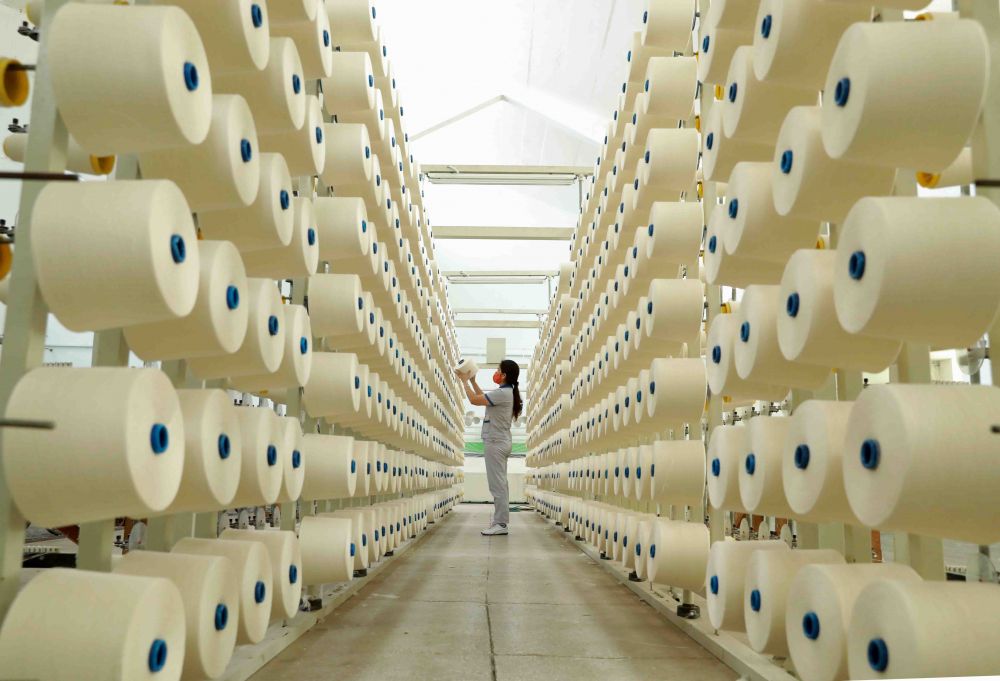 Dây chuyền sợi xuất khẩu tại Công ty TNHH dệt Phú Thọ. (Nguồn: TTXVN)