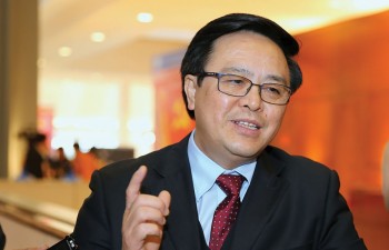 Party official: Party chief's visits bolster ties with France, Cuba