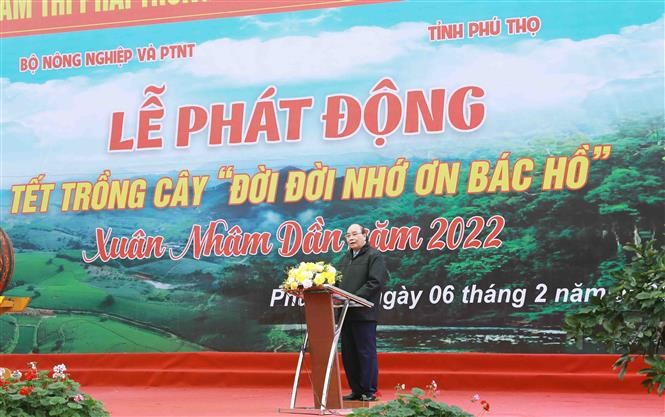 Chủ tịch nước Nguyễn Xuân Phúc đến dự và Phát động “Tết trồng cây đời đời nhớ ơn Bác Hồ”. (Nguồn: TTXVN)