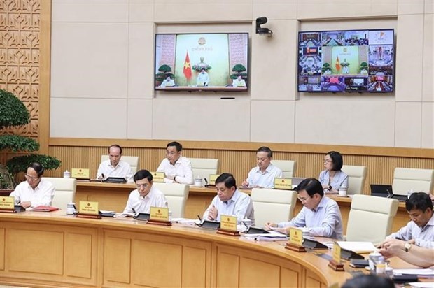 At the meeting. (Photo: VNA)