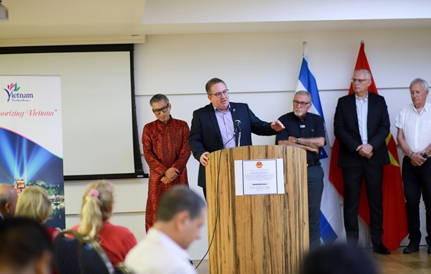 A speaker addresses the gathering held by the Vietnamese Embassy in Israel on July 19. (Photo: VNA)