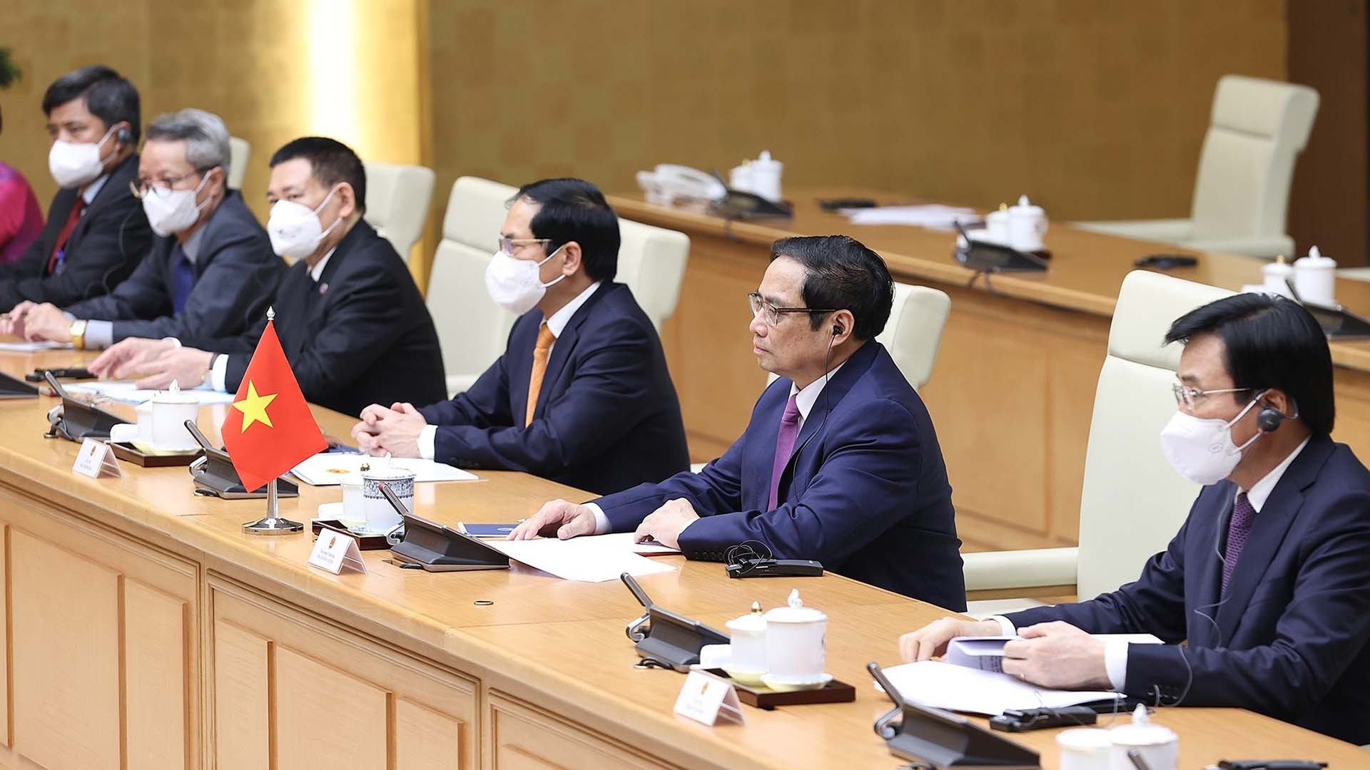 Thủ tướng Phạm Minh Chính và các thành viên đoàn Việt Nam tham dự buổi hội kiến. (Nguồn: TTXVN)