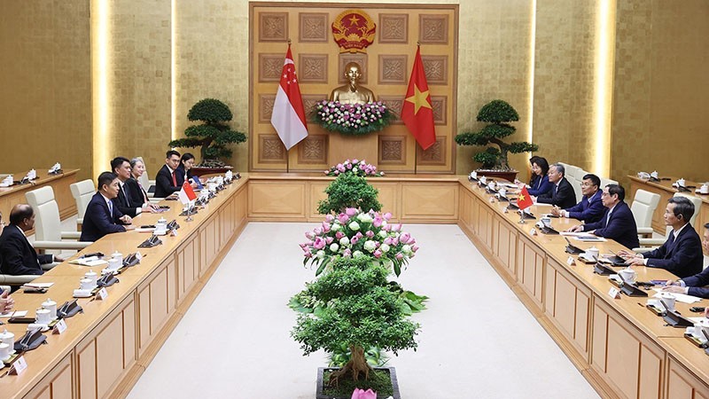 Thủ tướng Phạm Minh Chính tiếp Chủ tịch Quốc hội Singapore Tan Chuan-Jin. (Nguồn: TTXVN)