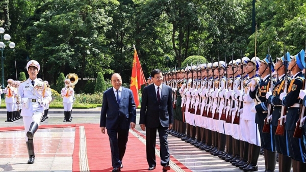 Welcome ceremony for top Lao leader in Ha Noi